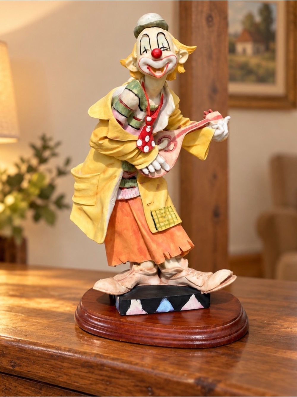 VINTAGE 13” MANDOLIN PLAYING CLOWN, WOOD BASE, HAND PAINTED WITH FUN COLORS. G13